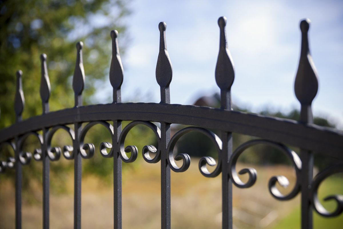 Wrought iron fence closee up Wrought iron fence closee up (desktop)