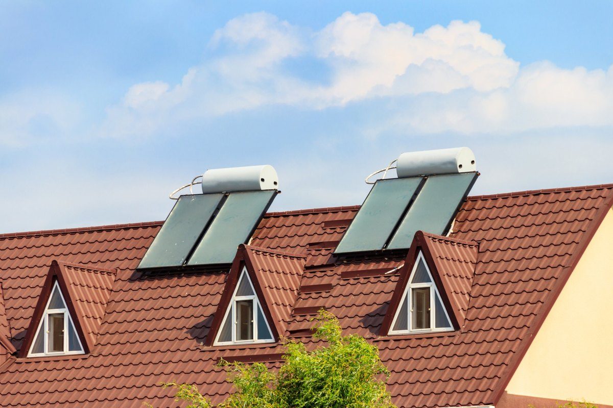 Solar water heater installed on a roof Solar water heater installed on a roof