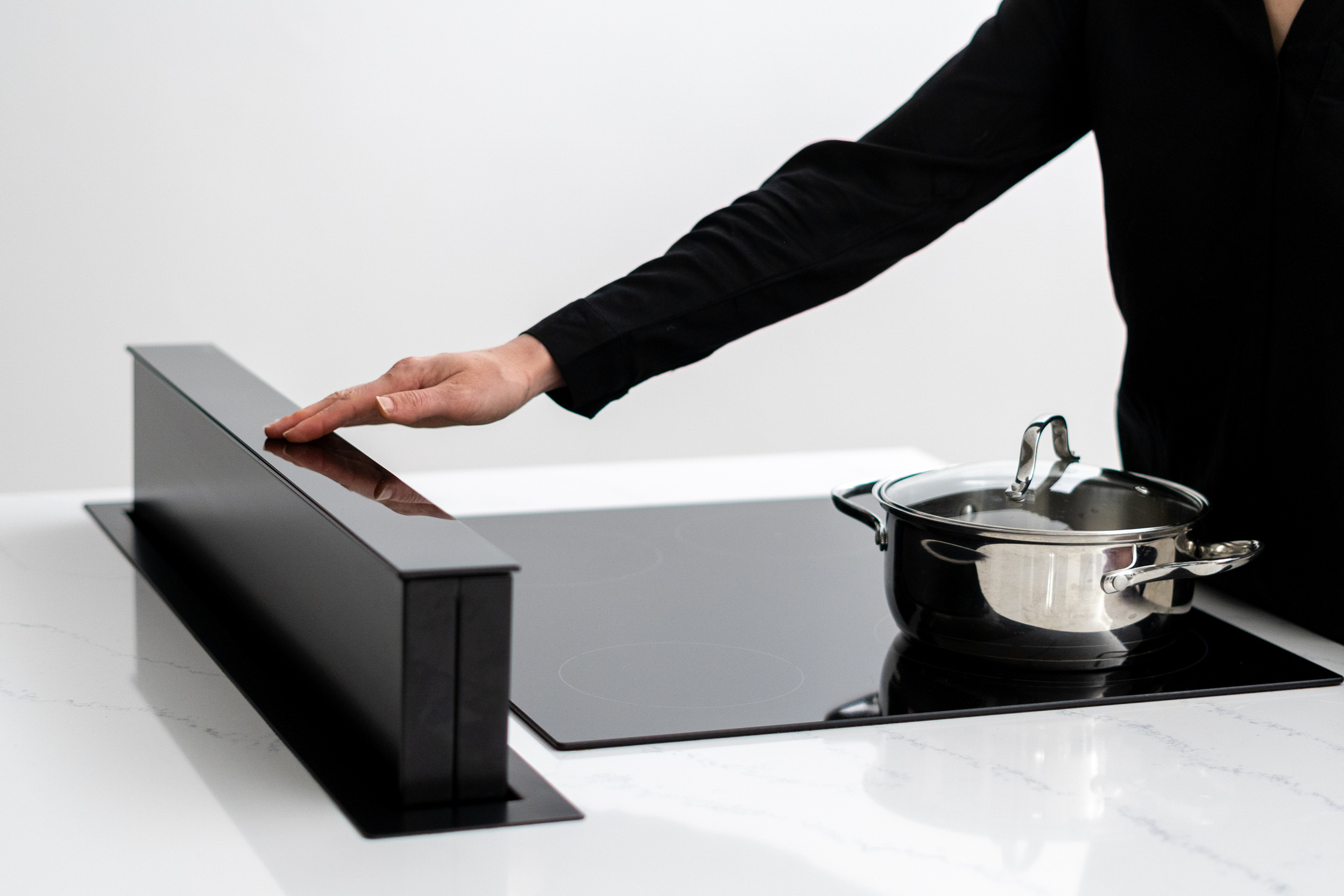 Campana extractora escamotable o downdraft