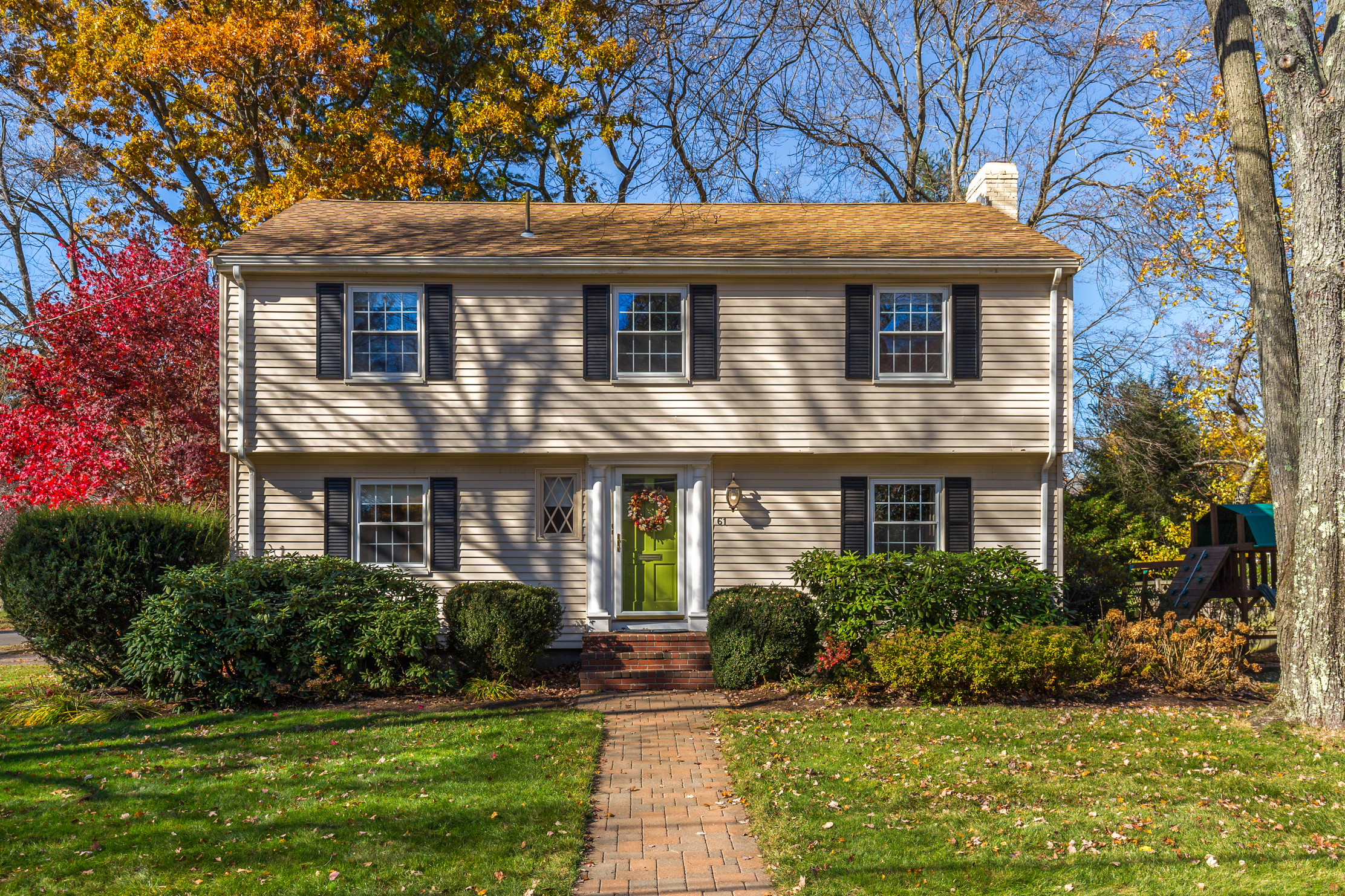 Exterior of a home with faux window shutters