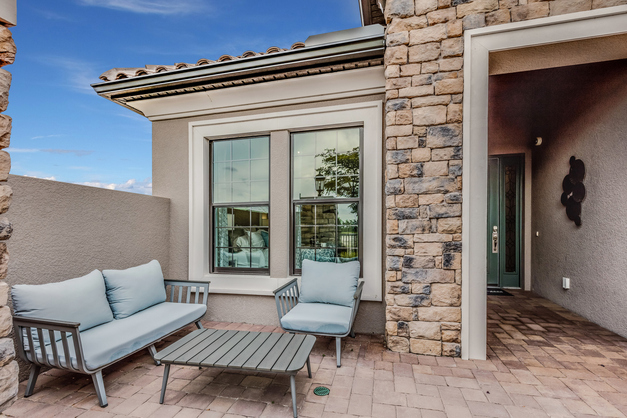 Exterior of a home with stone window trims