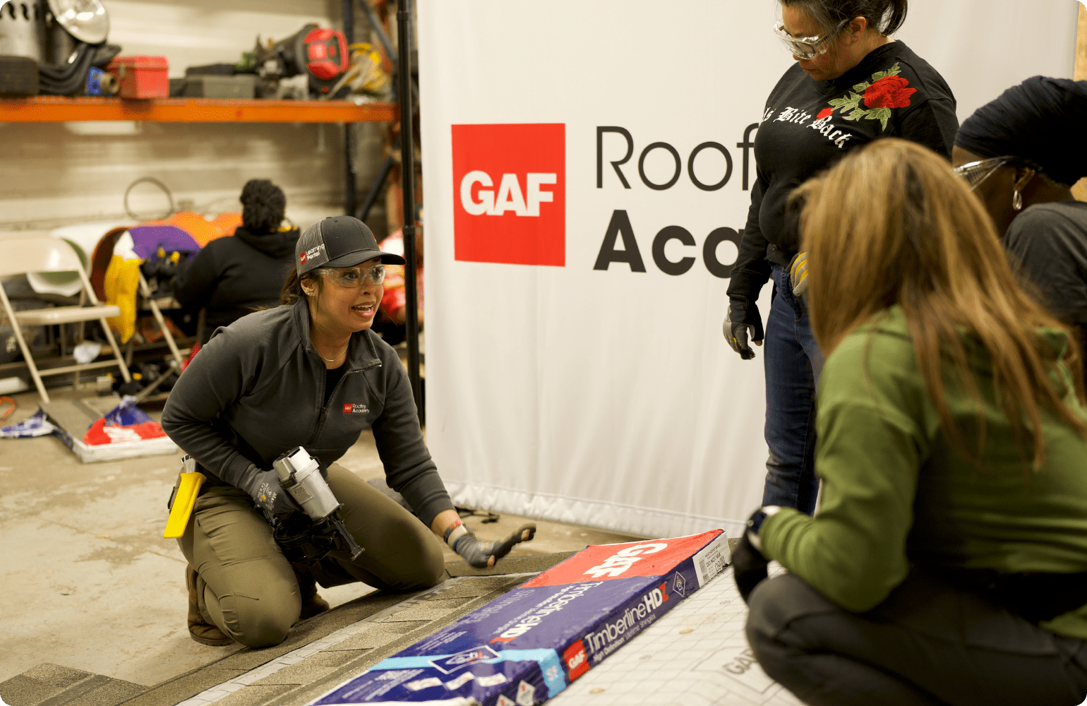 Kimberly Santiago, GAF Roofing Academy trainer explaining installation techniques